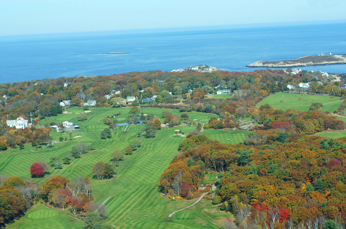 Aerial view across the course and coastline
